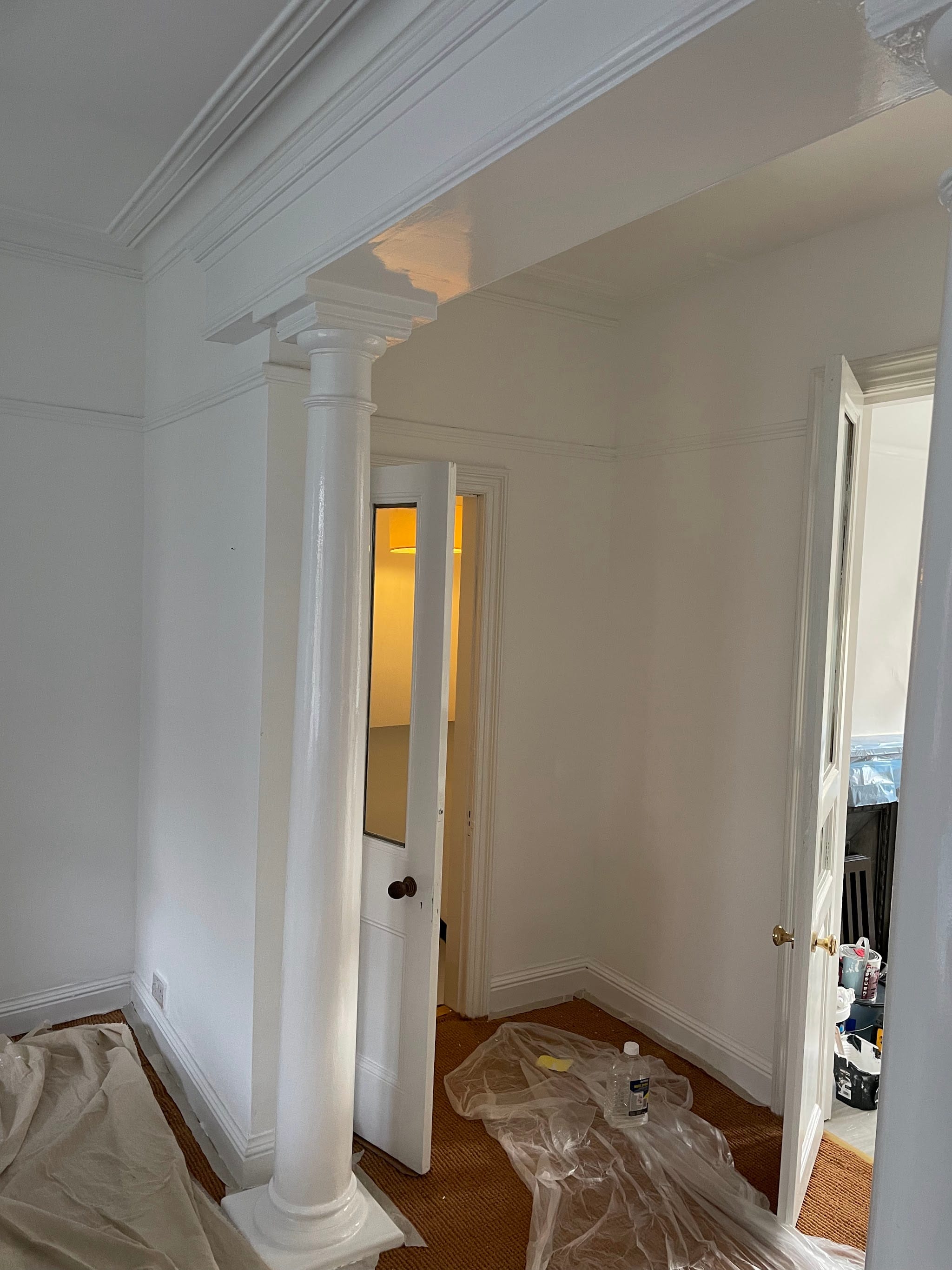 White columns and decorative ceiling moulding