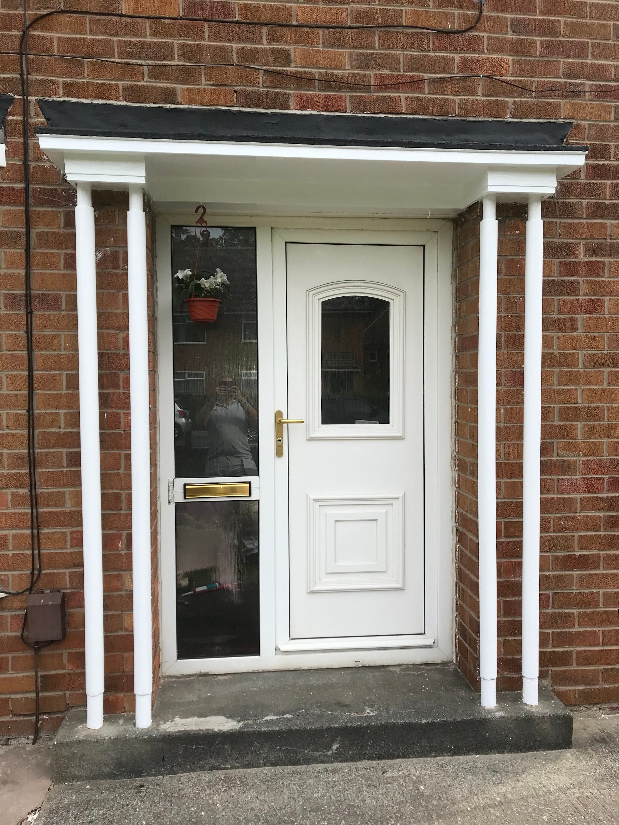 White front door, surround and pillars